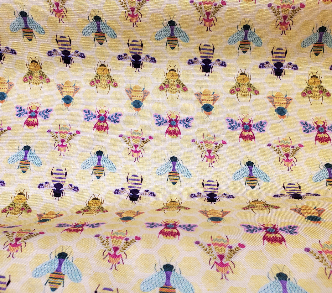 fancy multi colored floral bee print o yellow fabric
